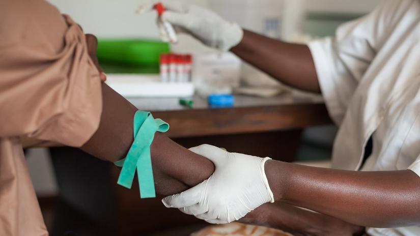 patient recieving injection in arm