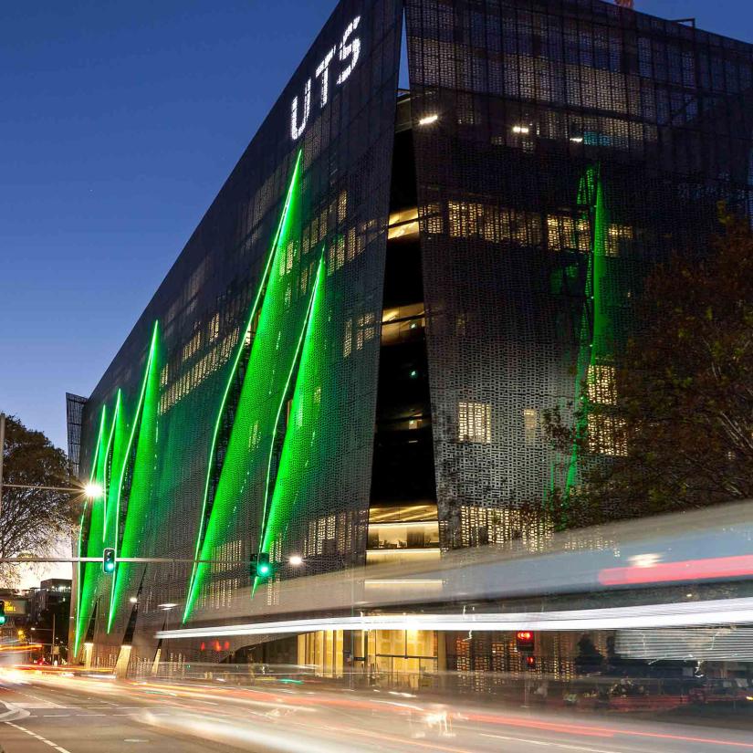 UTS IT building as seen from Central Park at night showing external lights