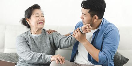 Elderly mother with adult son