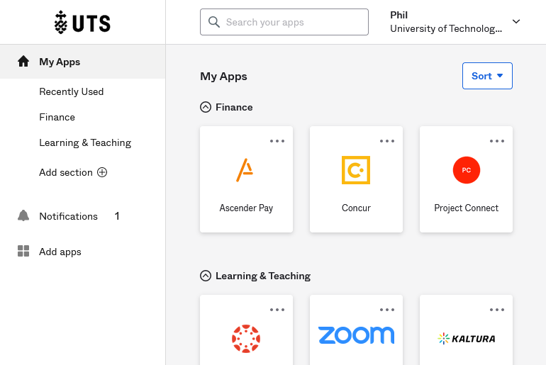 Screenshot of the Okta dashboard with a left nav menu and app tiles sorted into a 'Finance' section and a 'Learning & Teaching' section