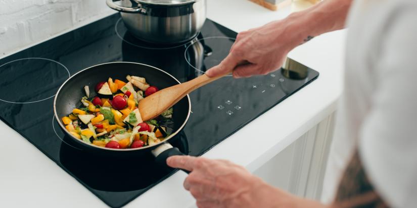 Man cooking vegetables