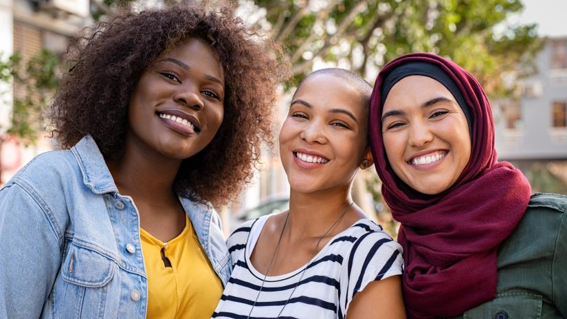 three women from diverse backgrounds