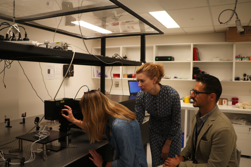 Researchers using Brillouin microscope in lab at UTS