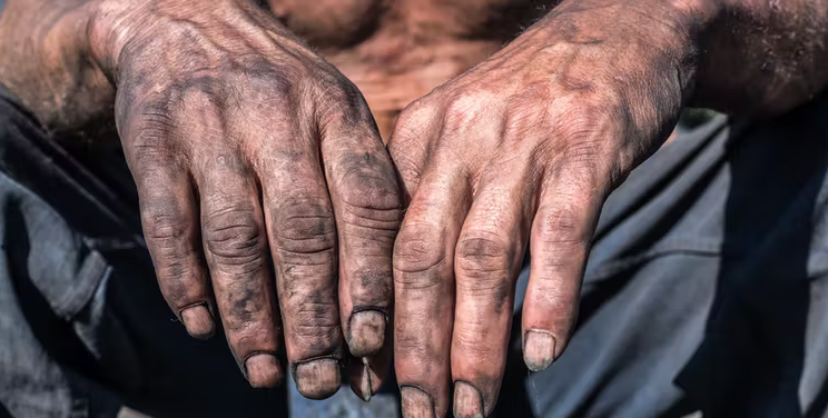 Image of coal workers hands