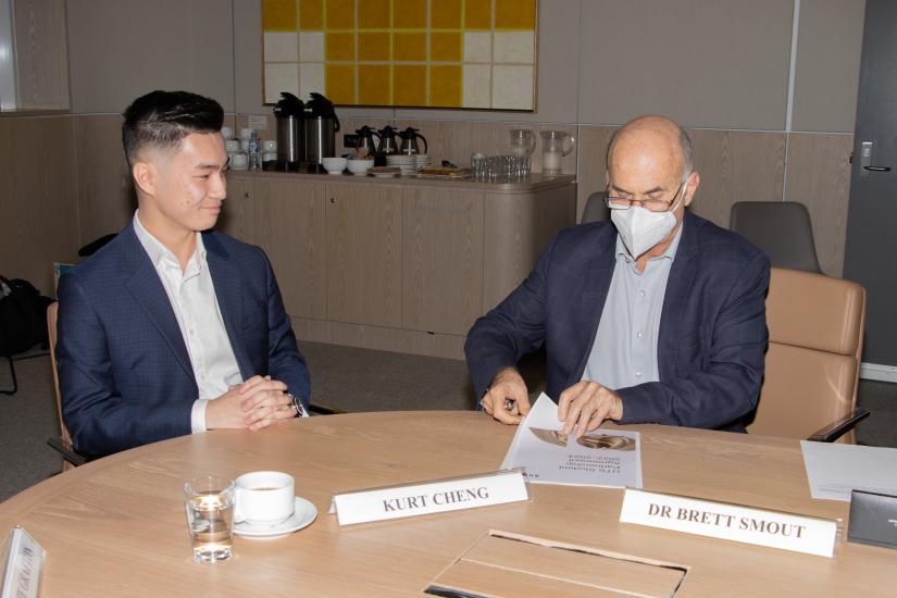 Kurt Cheng and Dr Brett Smout sign the Student Partnership Agreement