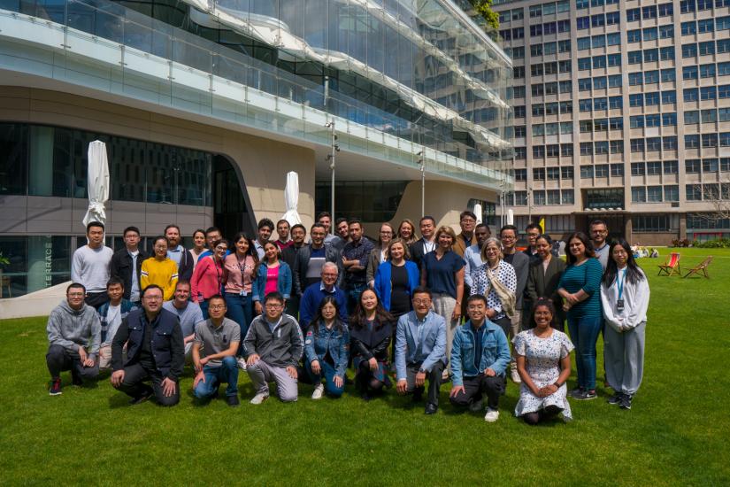 Large group of people pose for a group photo