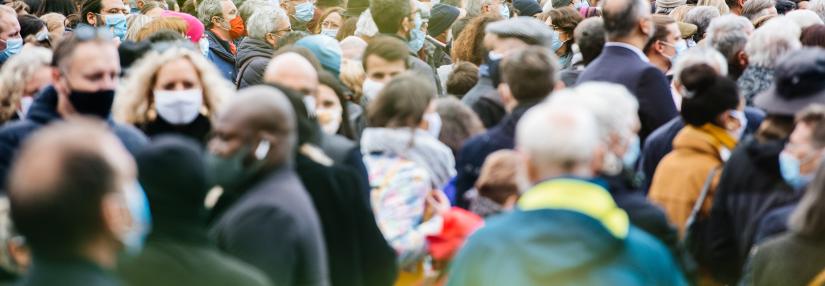 Crowd of people outdoors wearing face masks