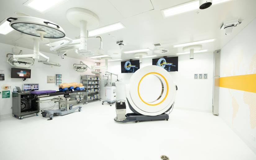 A Stryker Aero CT scan sits in the middle of a laboratory.