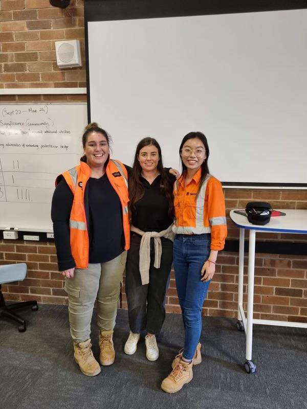 WiEIT Emily Crozier- at her workplace with her colleagues