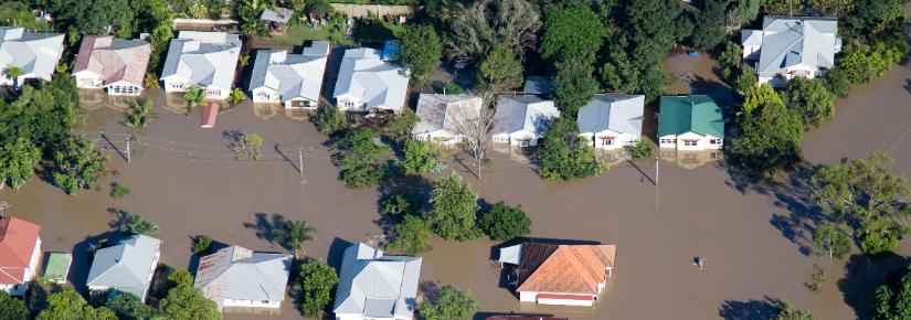 Flooded houses. Image: Adobe Stock