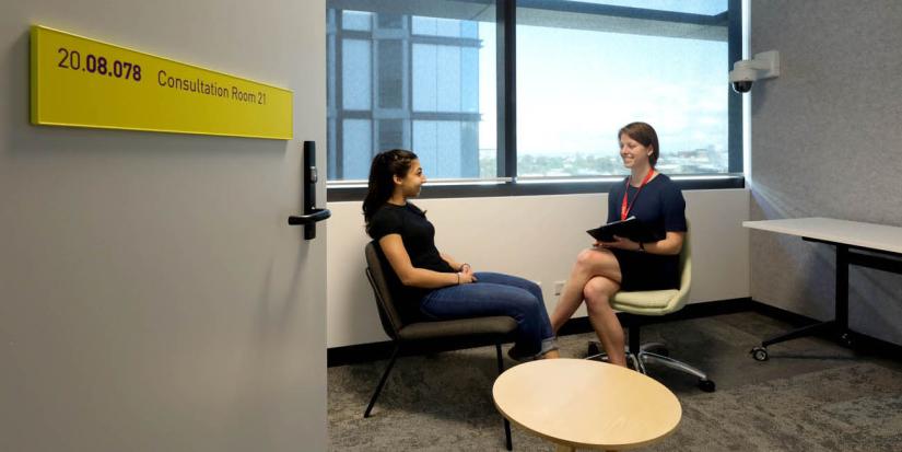 UTS clinical psychology students sitting in office, talking