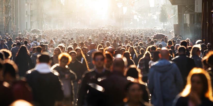 Crowd of people walking on the street