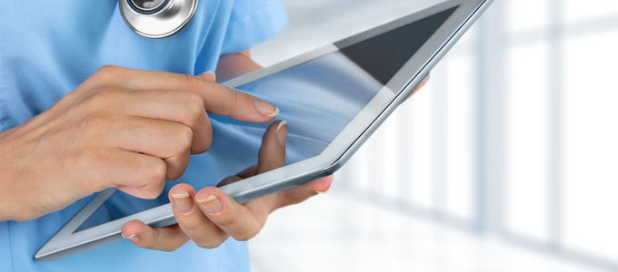 Nurse holding an iPad