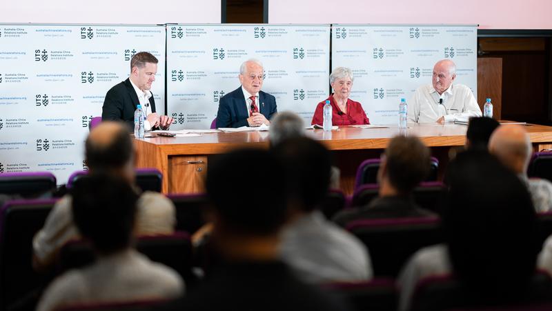 Panel speakers and audience