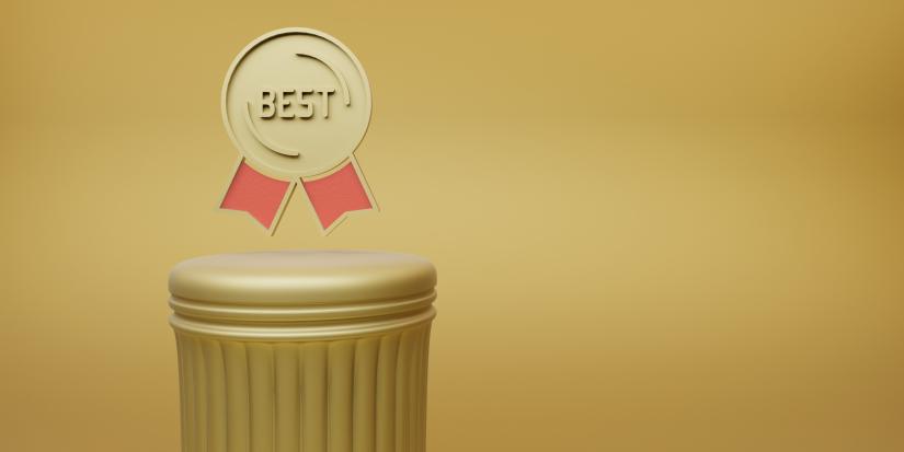 Golden badge saying ‘best’ above a gold column with a gold background.