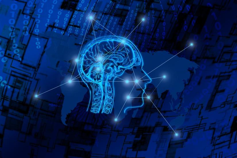 human brain in side profile face linked out to global network