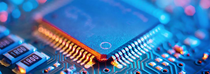 a close up picture of computer microchips and processors on a electronic circuitboard