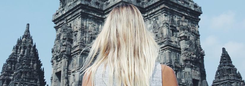 Tourist at a temple in Indonesia. Image: Unsplash