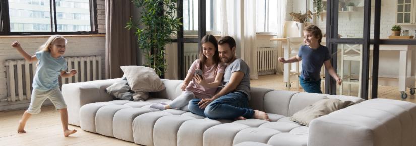 family in an apartment. Image: Adobe Stock