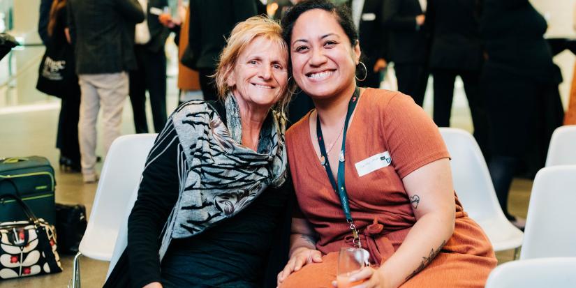 Aunty Glendra and Christine Afoa sitting together and smiling