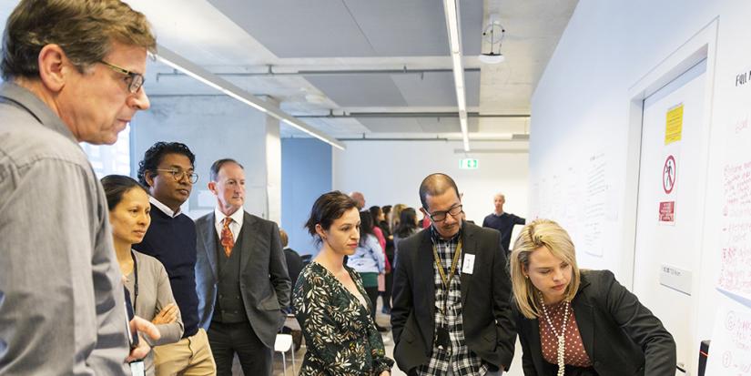 Research Staff in a meeting inside UTS offices. Photo: Andy Roberts