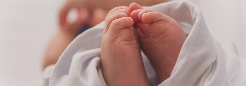 Close up of newborn baby's feet