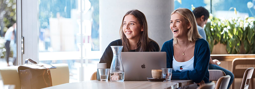 2 girls sitting in the Terrace Cafe