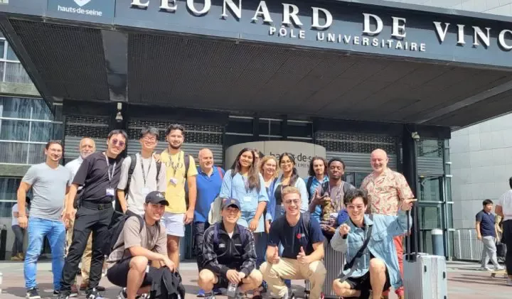 A souvenir photo outside De Vinci Higher Education Campus