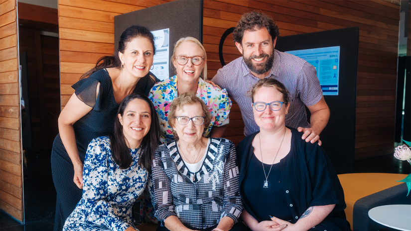 Six people at the PaCCSC & CST Annual Research forum 2023 - three in front row, three in back row - smiling at the camera.