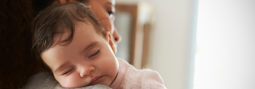 Mother with sleeping baby