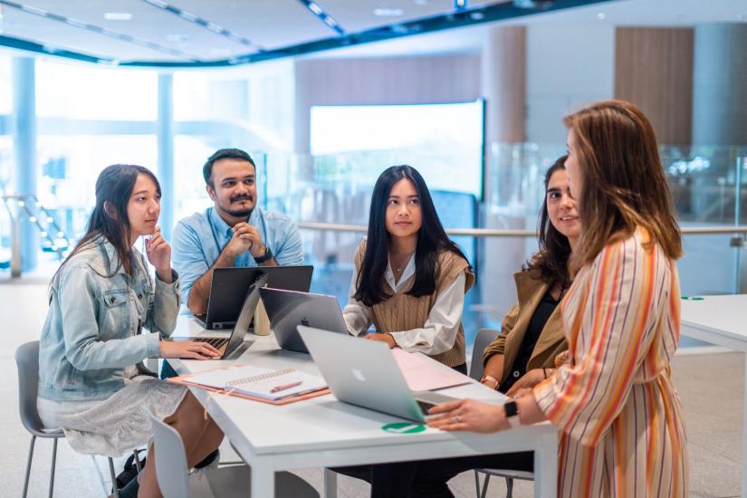 A group of international students are collaborating