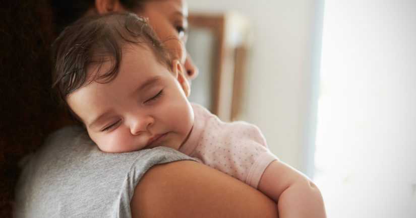 Mother with sleeping baby