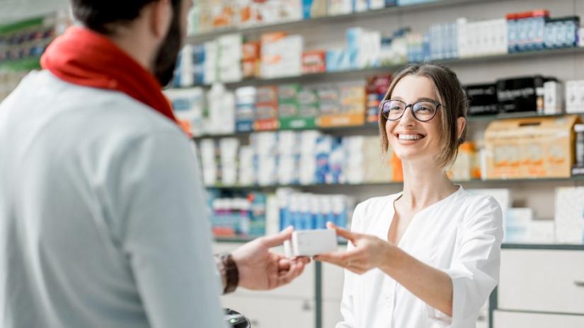 Pharmacist with customer