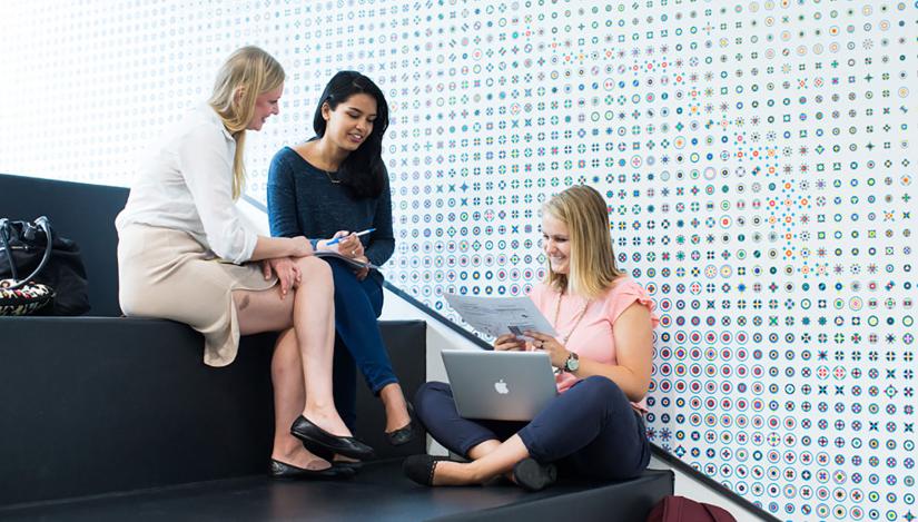 Women sitting together on stairs
