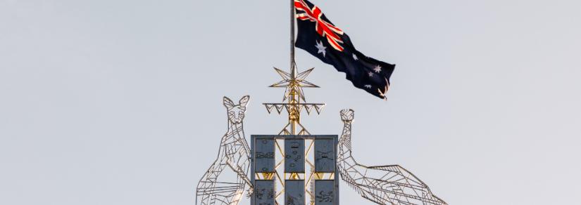 Australian Flag on Parliament House. Adobe Stock