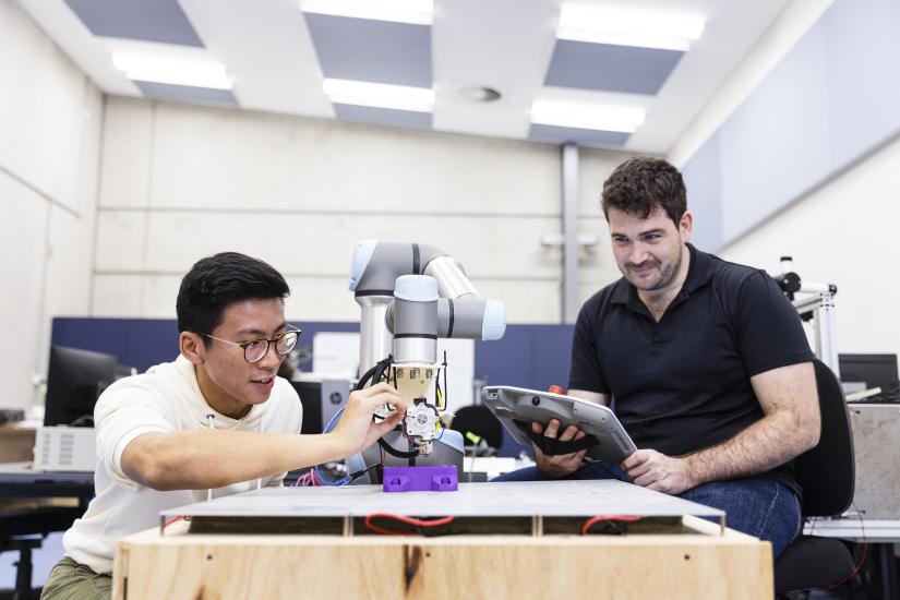 Clyde Webster working on his Robot Parrot