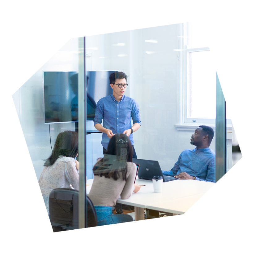 A group of international students in a meeting room