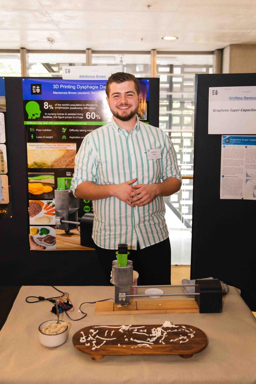 Student presenting at Capstone Showcase