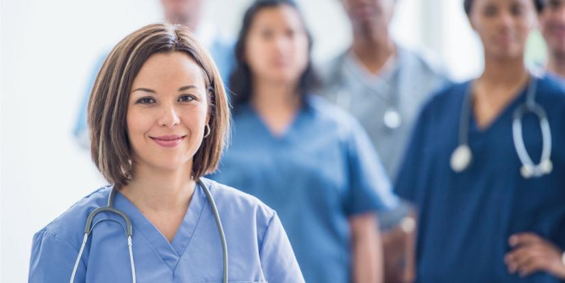Female-nurse-looking-at-camera-stock