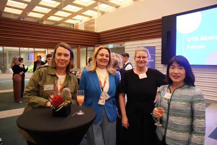 Image of 4 women smiling at the camera