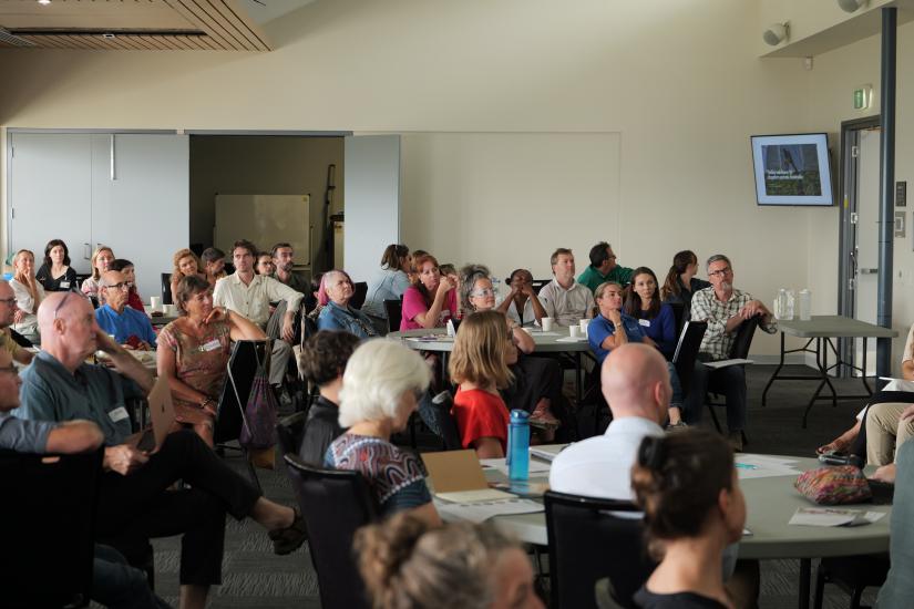 Wide shot of group participants at a Roundtable discussiom