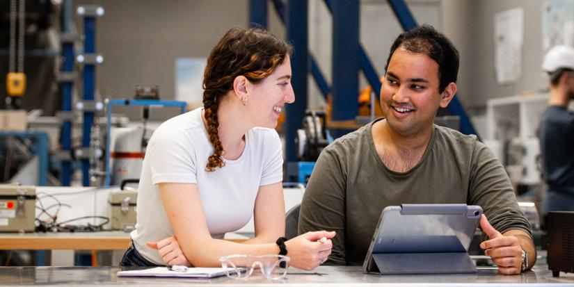 Two mechanical engineering students sitting in a classroom
