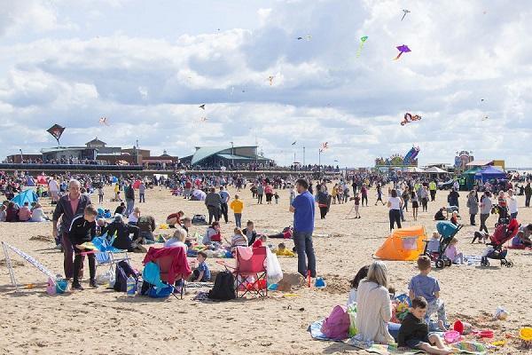 The Beach - scene of people picnicking on the beach