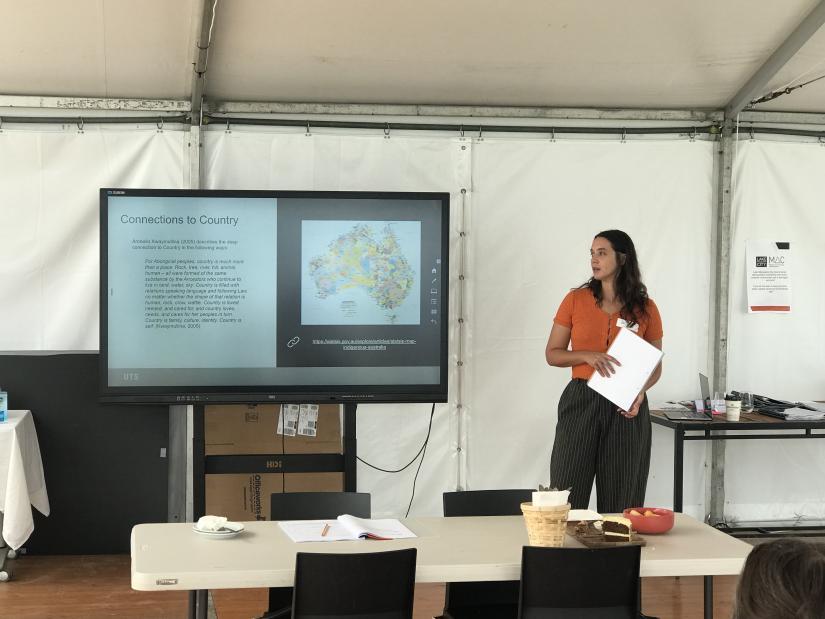 Dr Lauren Booker presenting at a workshop.