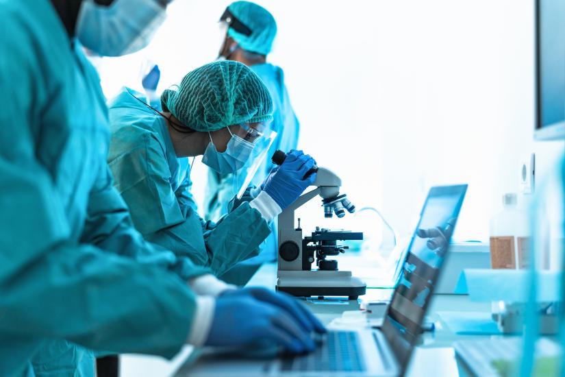 medical researchers in a lab. Adobe Stock