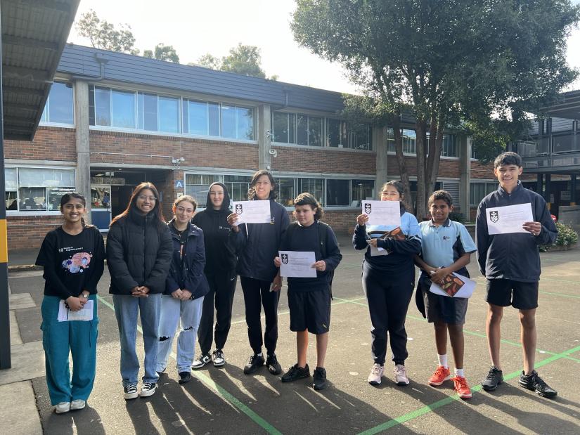 Leichardt students showing their certificates