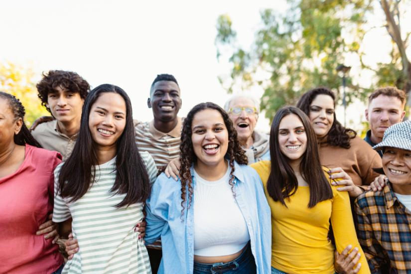 Multicultural group of people in a park.