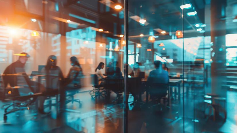 Blurred groups of people in a conference room