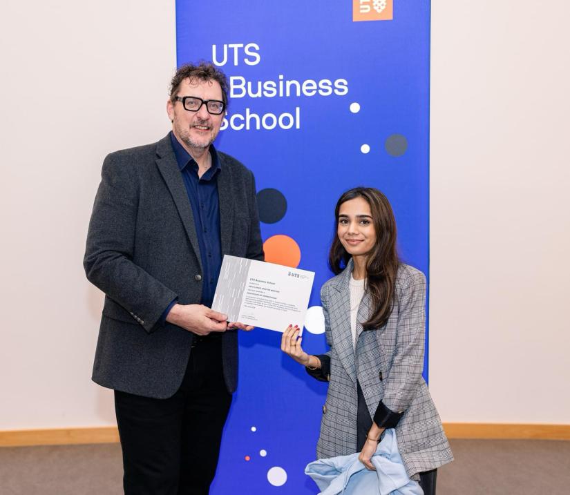 Arya Lohar with Carl Rhodes Dean of UTS Business School receiving a UTS Business Mentorship Award 2024