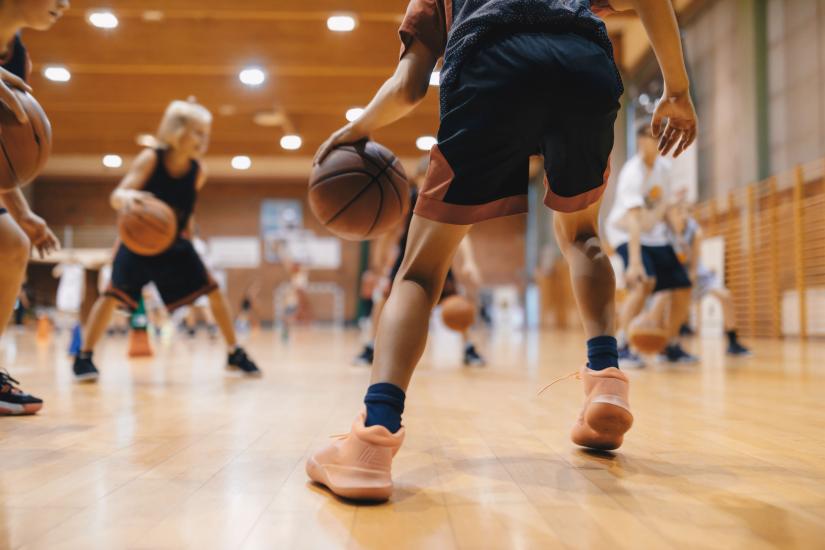 Stock picture of a basketball training session for young people.